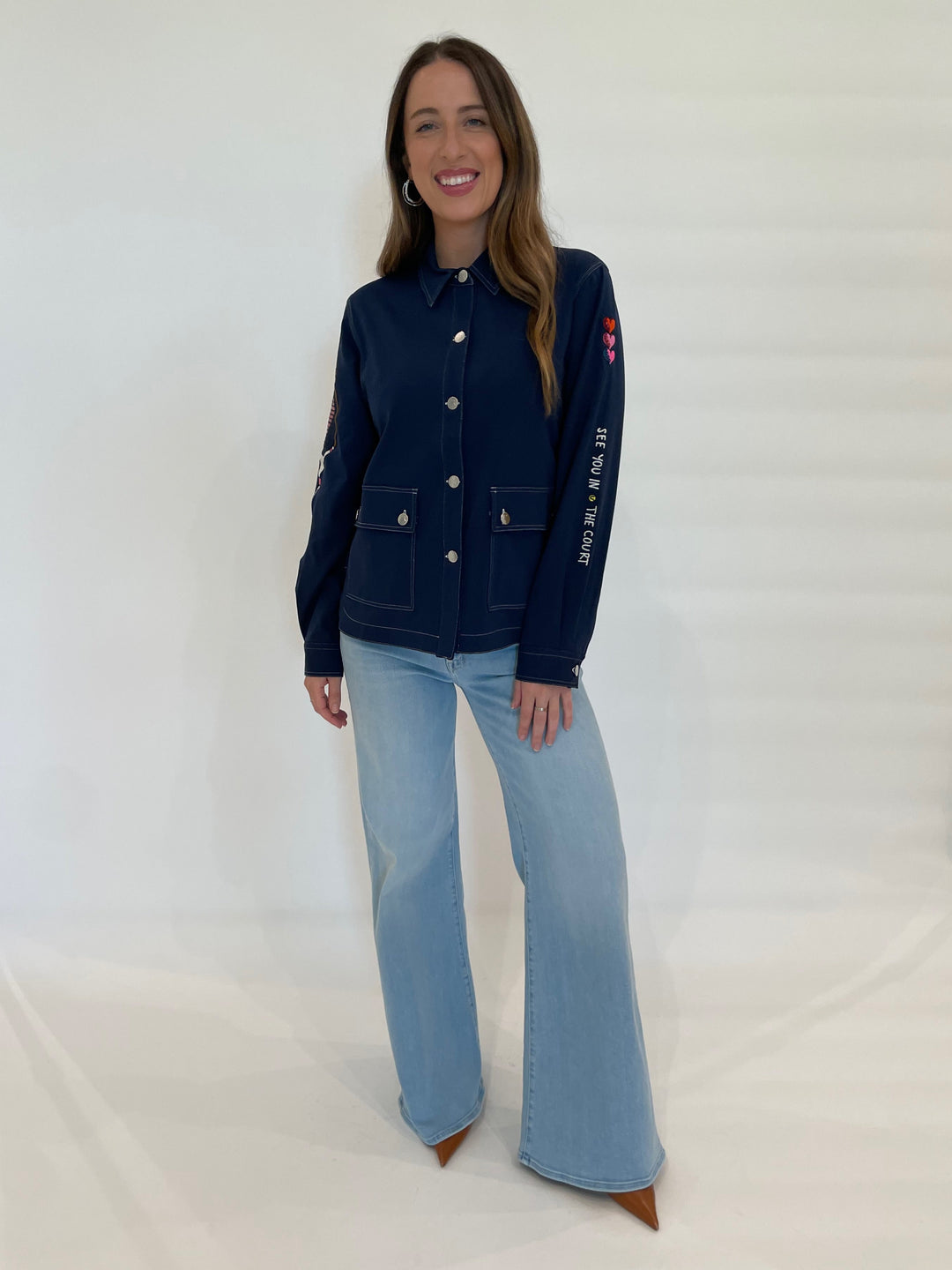 Vilagallo Frances Punto Roma Embroidered Jacket With Pockets in Navy paired with Mother Denim The Roller Sneak Jeans in Ball's In Your Court available at Barbara Katz