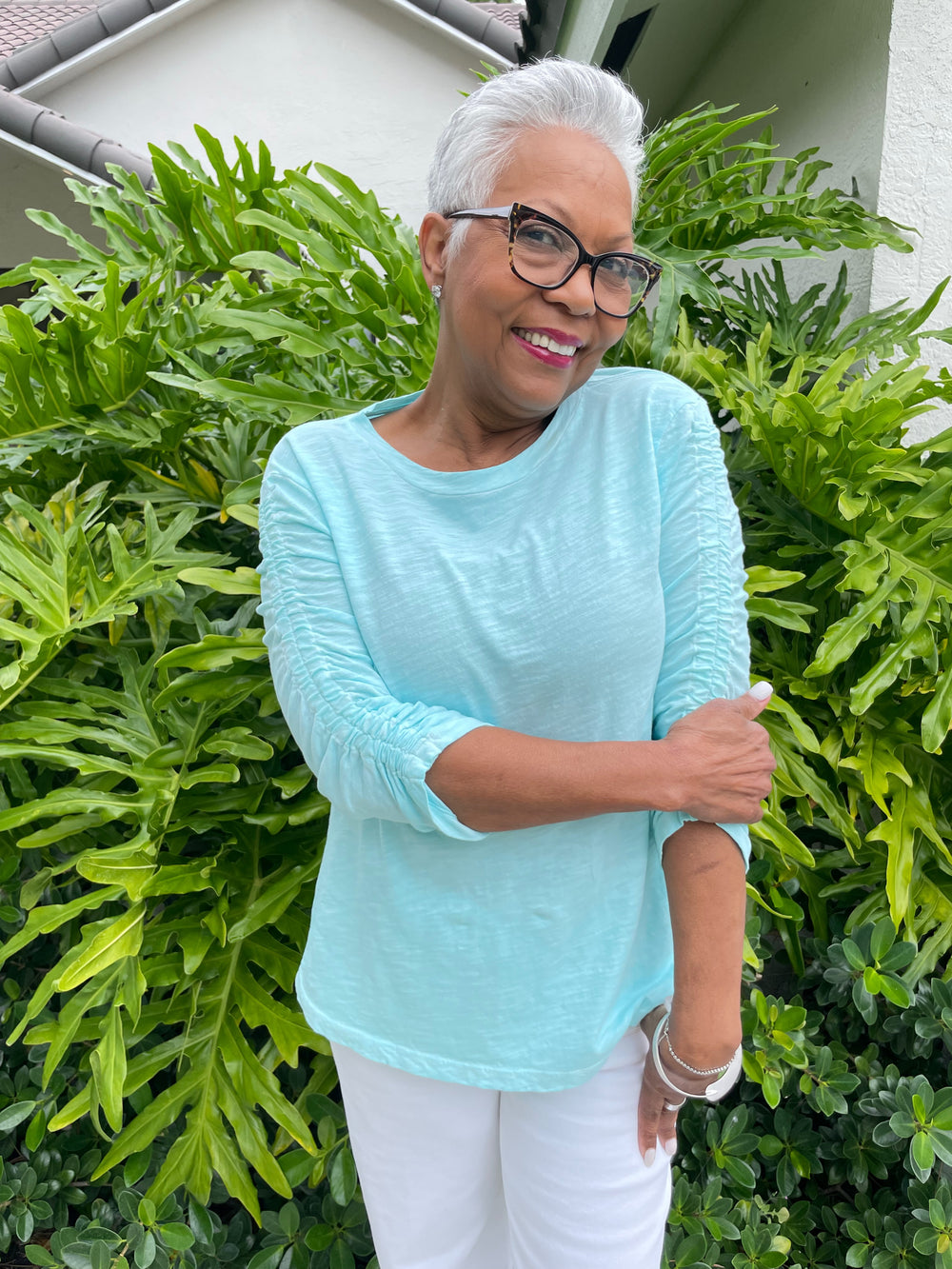 Elliott Lauren Hannah Crew Neck Ruched Sleeve Tee in Mist paired with Citizens of Humanity Palma Straight Jeans in Soft White, Dean Davidson Crosby Hinged Bangle in Silver available at Barbara Katz