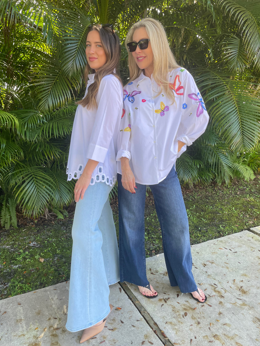 WHYCI Dali 3/4 Sleeve Shirt in White paired with Mother Denim and WHYCI Mariela Hand-painted Butterfly Shirt in White/Multi paired with Frame Denim available at Barbara Katz