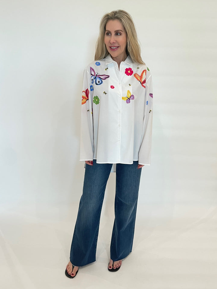 WHYCI Mariela Hand-painted Butterfly Shirt in White/Multi paired with Frame Denim Le Slim Palazzo Raw After Jeans in Lupine available at Barbara Katz