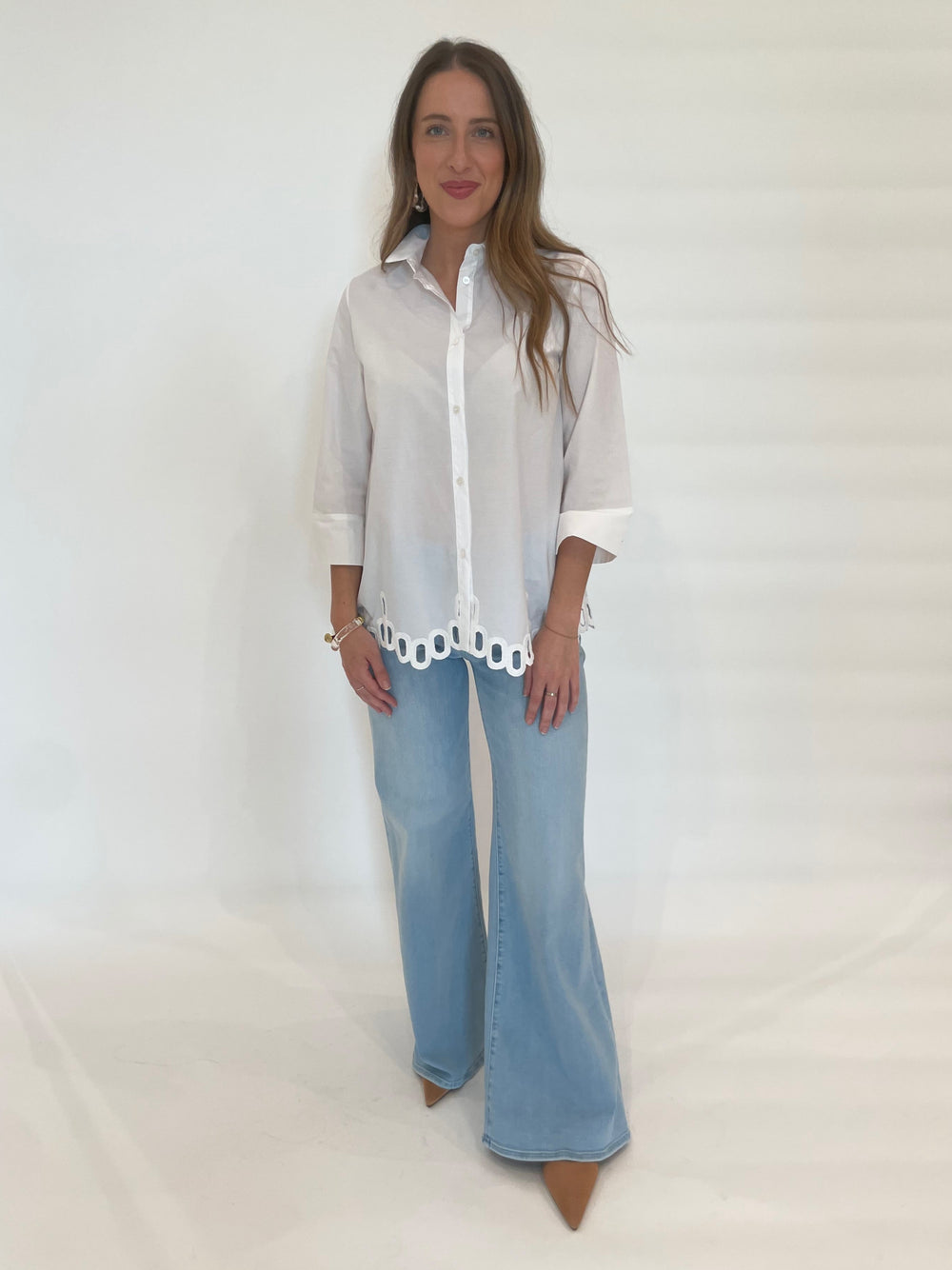 WHYCI Dali Shirt in White paired with Mother Denim The Roller Sneak Jeans in Ball's In Your Court available at Barbara Katz