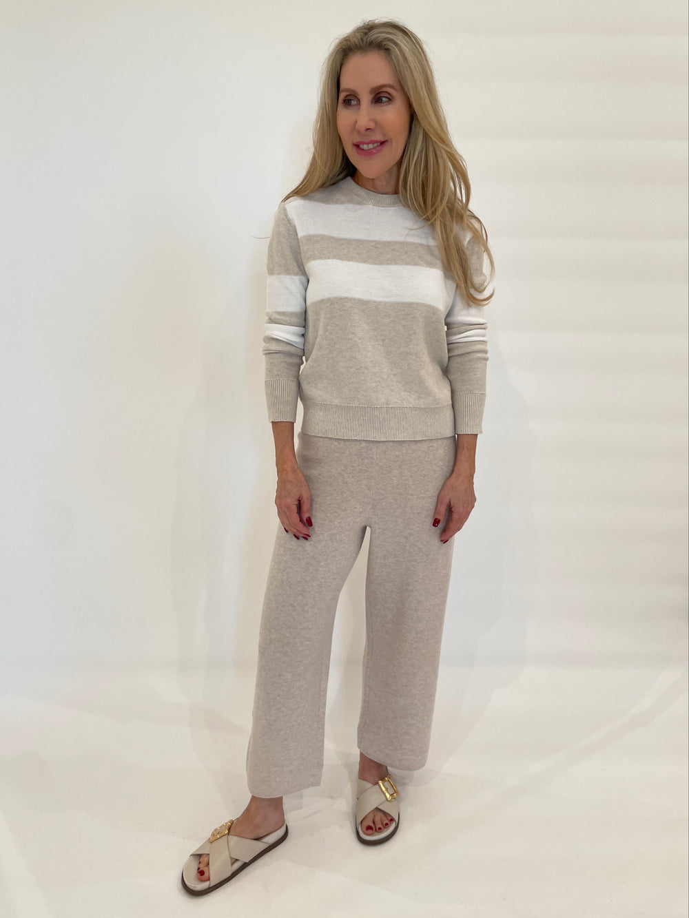 Kinross Lumi Crop Stripe Crew Sweater in Champagne/White paired with Kinross Coverstitch Crop Pants in Wicker available at Barbara Katz