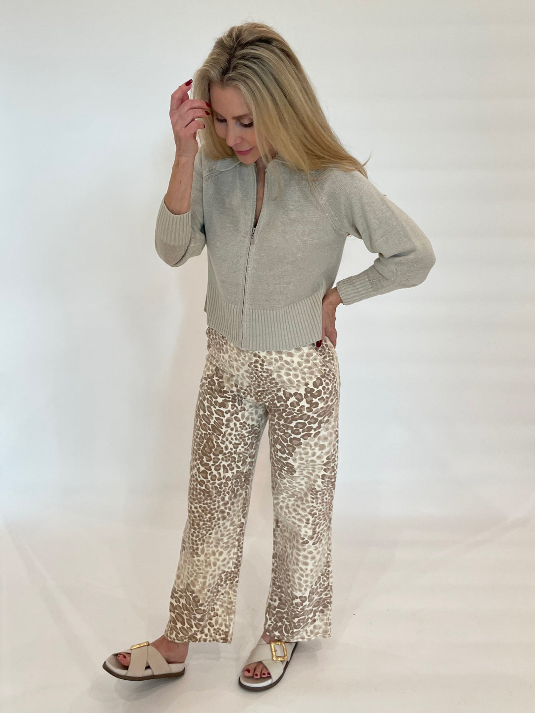 Kinross Crop Zip Cardigan in Sandstone paired with Mother Denim The Major Zip Ankle Pants in Spot On available at Barbara Katz