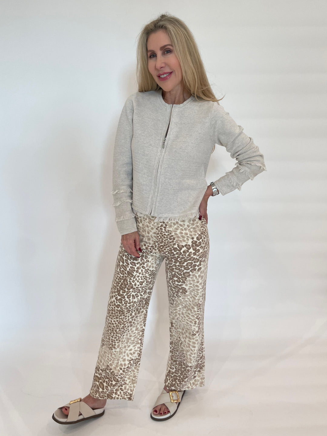 Kinross Fringe Zip Cardigan in Champagne paired with Mother Denim The Major Zip Ankle Pants in Spot On available at Barbara Katz