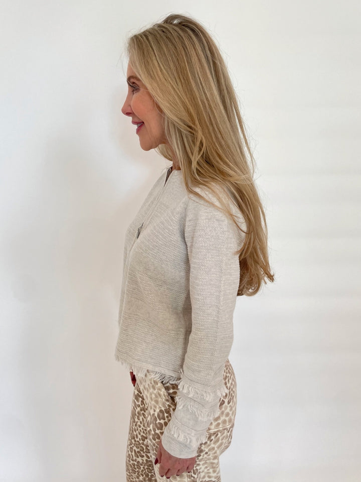 Kinross Fringe Zip Front Long Sleeve Cardigan in Champagne available at Barbara Katz