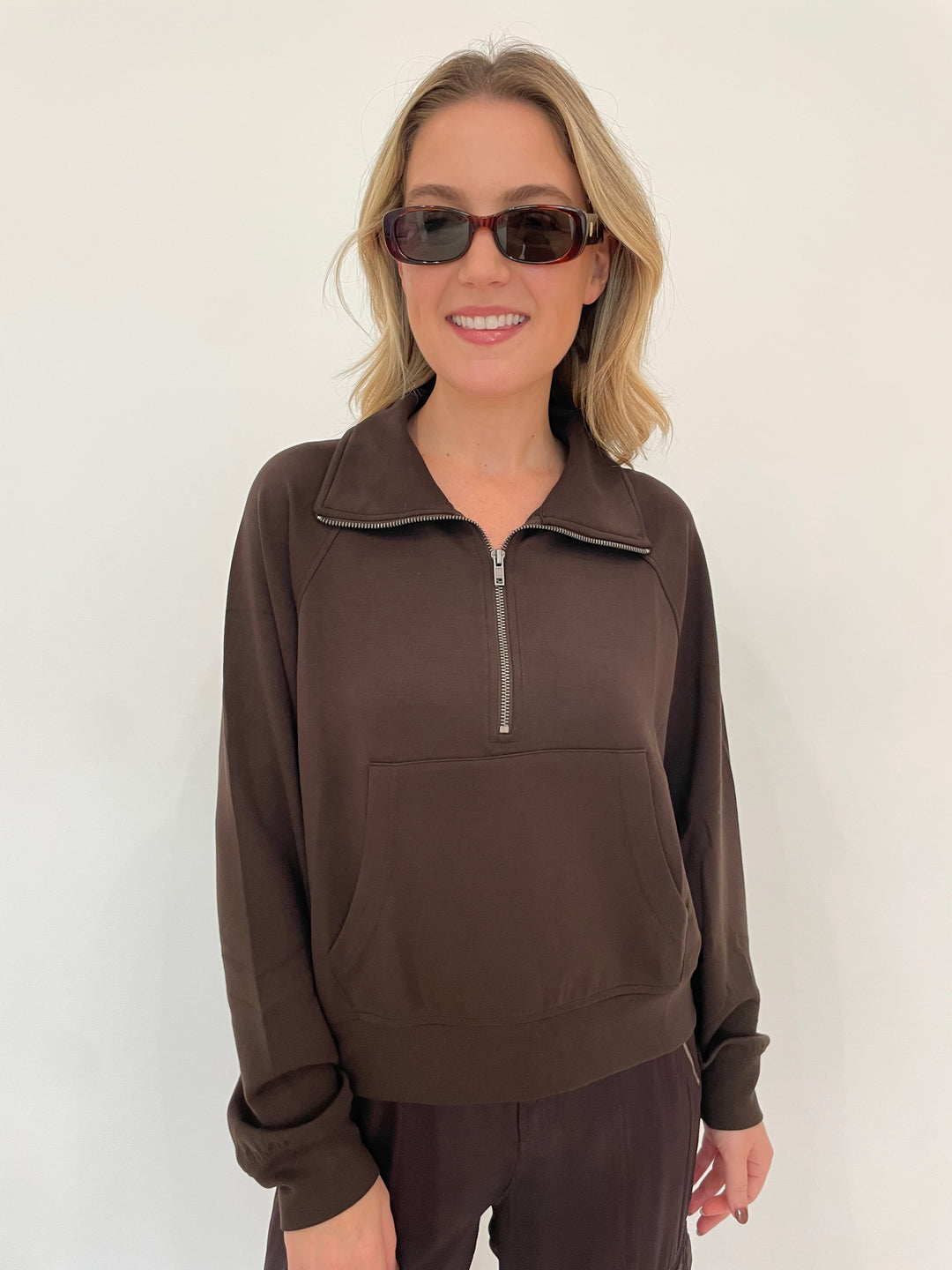 BK Caroline Half Zip-Up Collar Sweatshirt in Chocolate Brown with Le Specs Unreal! Sunglasses in Toffee Tort available at Barbara Katz