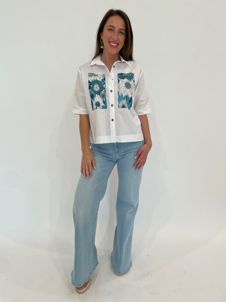 Terra Carmen Flower Shirt in White/Blue paired with Mother Denim The Roller Sneak Jeans in Ball's In Your Court available at Barbara Katz