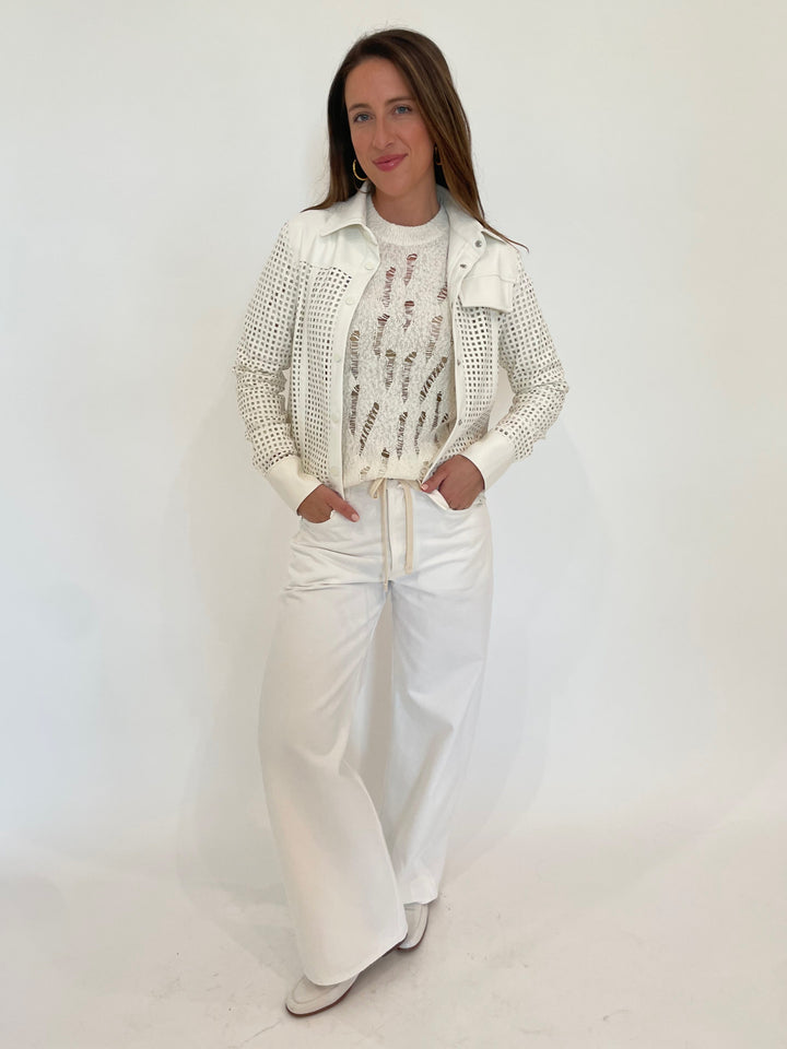 BK Lisa Perforated Shirt in White with Autumn Cashmere Lucy Distressed Ladder Stitch Crew Sweater in Starch underneath, paired with Citizens of Humanity Brynn Drawstring Trousers in Tulip available at Barbara Katz