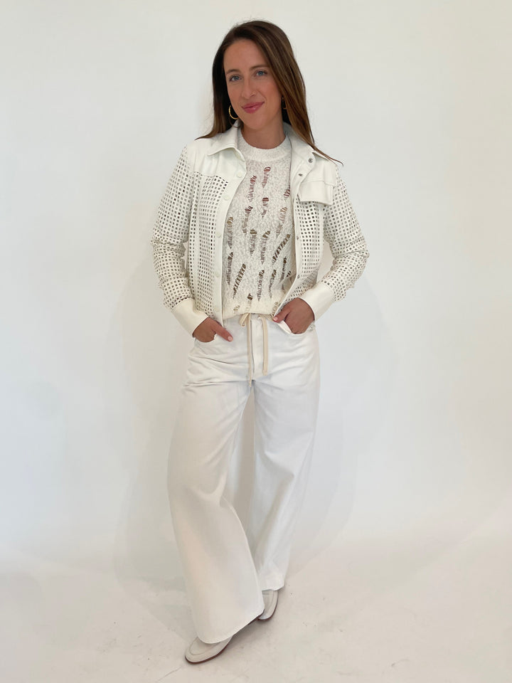 BK Lisa Perforated Shirt in White with Autumn Cashmere Lucy Distressed Ladder Stitch Crew Sweater in Starch underneath, paired with Citizens of Humanity Brynn Drawstring Trousers in Tulip available at Barbara Katz