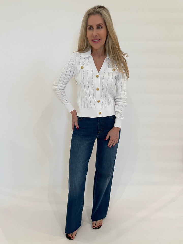 Kinross Somary Rib Button Front Polo Sweater in White paired with Frame Denim Le Slim Palazzo Jeans in Lupine available at Barbara Katz