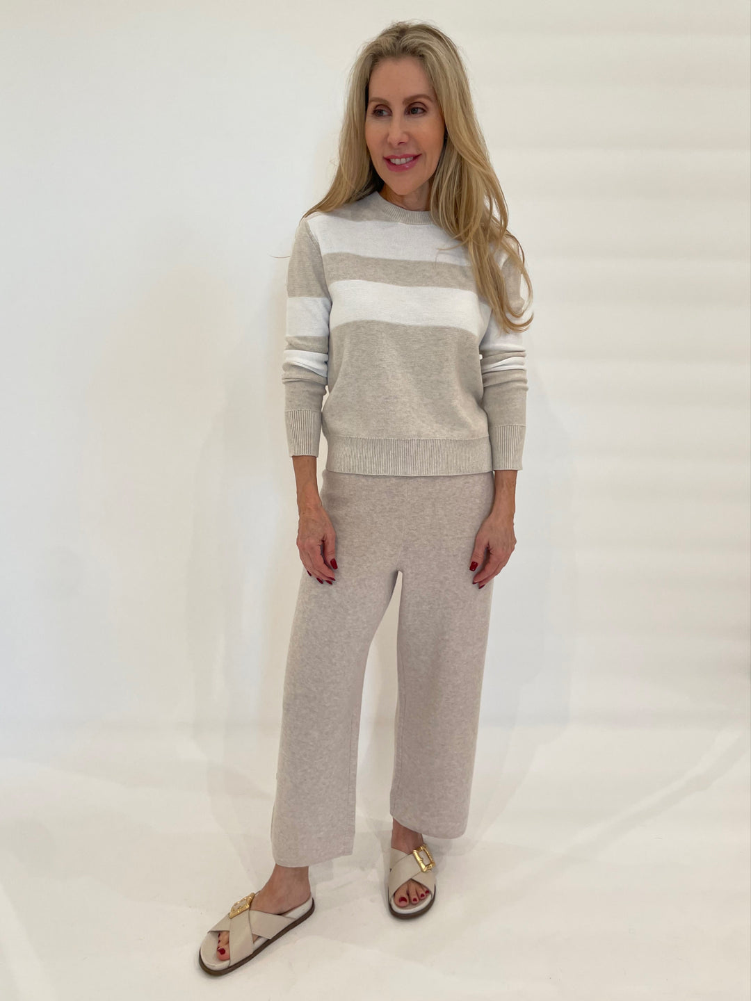 Kinross Lumi Crop Stripe Crew Sweater in Champagne/White paired with Kinross Coverstitch Crop Pants in Wicker available at Barbara Katz