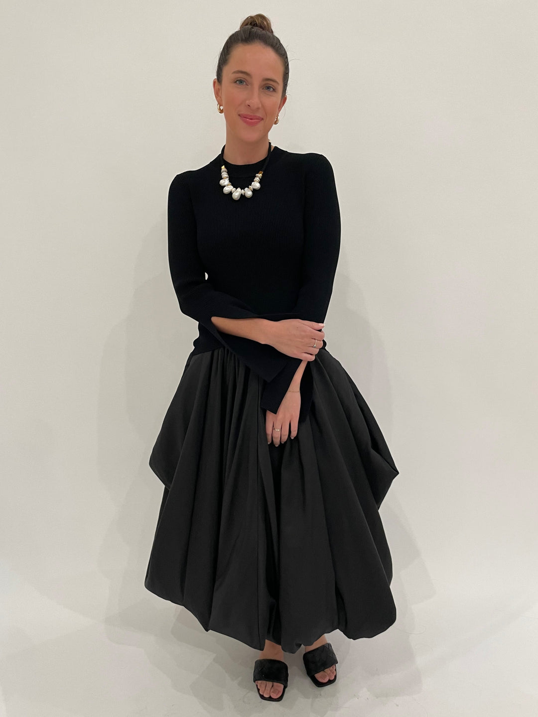 Simkhai Kenlie Long Sleeve Mock Neck Midi Dress in Black paired with Lizzie Fortunato Plaza Pearl Collar Necklace and Gold Onda Hoops available at Barbara Katz