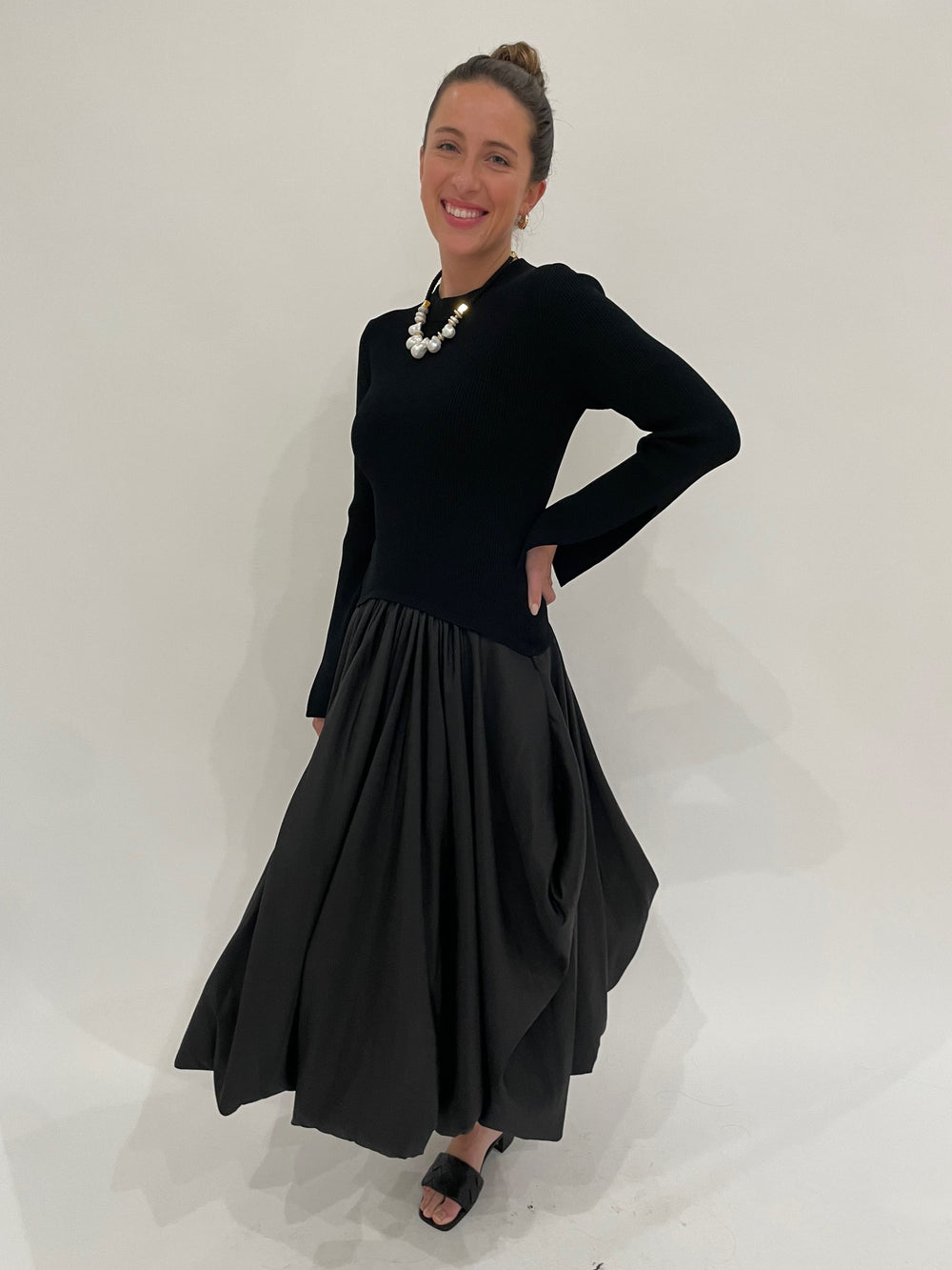 Simkhai Kenlie Long Sleeve Mock Neck Midi Dress in Black paired with Lizzie Fortunato Plaza Pearl Collar Necklace and Gold Onda Hoop Earrings available at Barbara Katz