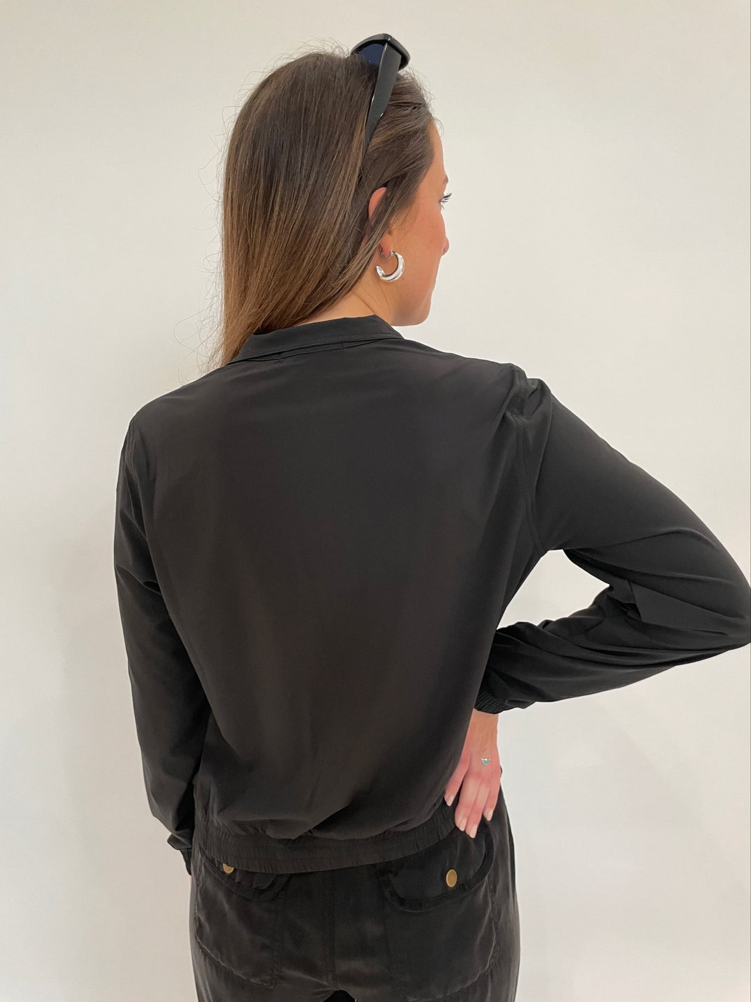 Wearables Active Quinn Long SLeeve Bomber Jacket in Black with Lizzie Fortunato Onda Hoops in Silver available at Barbara Katz