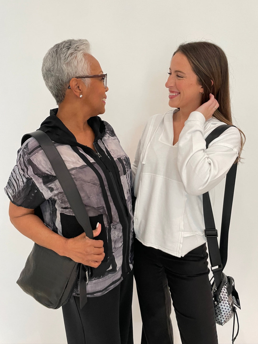 Terra Dana Zip-Up Shirt in Black, Wearables Ruby Hoodie in White available at Barbara Katz