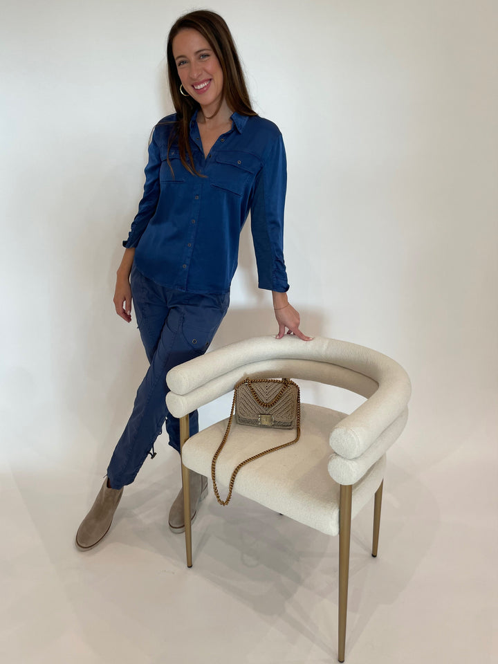 XCVI Silvia Snap Button-Up Shirt in Stellar paired with matching XCVI Stacey Slim Pants in Stellar, Gabor Suede Ankle Boots, Dean Davidson Gold Nomad Midi Hoops, Noam Hazan Mini Milan Bag in Stone available at Barbara Katz