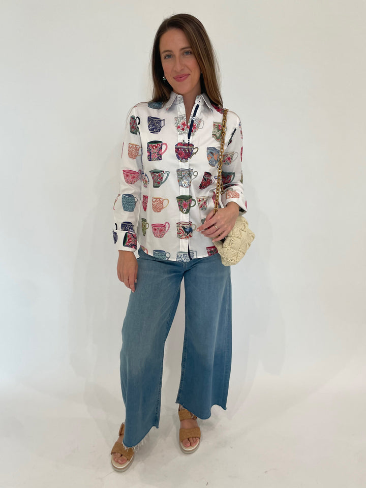 Dizzy-Lizzie Rome Shirt in Coffee Mugs Print paired with Citizens of Humanity Denim Lyra Crop Wide Leg Jeans in Bhodi, Noam Hazan Jade Bag in Cream available at Barbara Katz