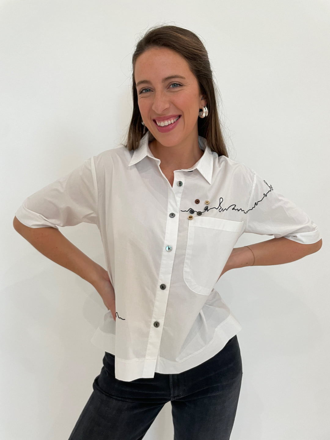 Terra Angela Short Sleeve Boxy Button Shirt in White with Lizzie Fortunato Onda Hoops in Silver available at Barbara Katz