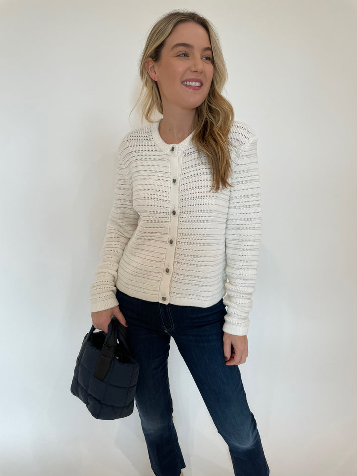 Autumn Cashmere Solid Textured Stripe Jacket in Bleach White paired with Mother The Insider Crop Step Fray Jeans in Off Limits, Vee Collective Porter Mini Tote Bag in Deep Sea available at Barbara Katz