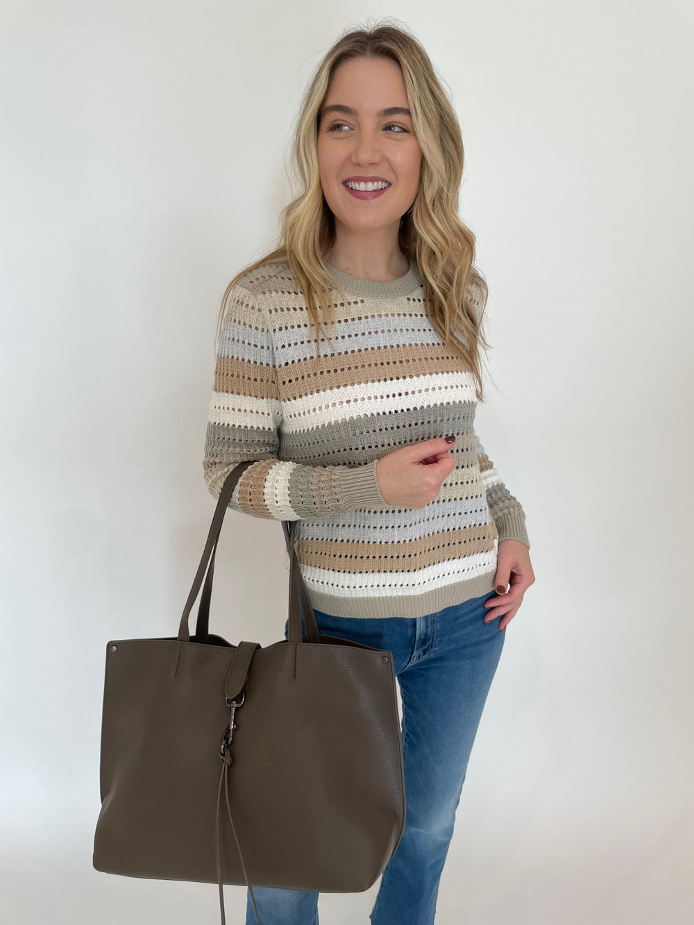 Autumn Cashmere Rainbow Pointelle Stripe Sweater in Neutral Multi paired with Mother The Hustler Ankle Fray Jeans in Grasping At Straws, BK London Tote Bag in Grey available at Barbara Katz