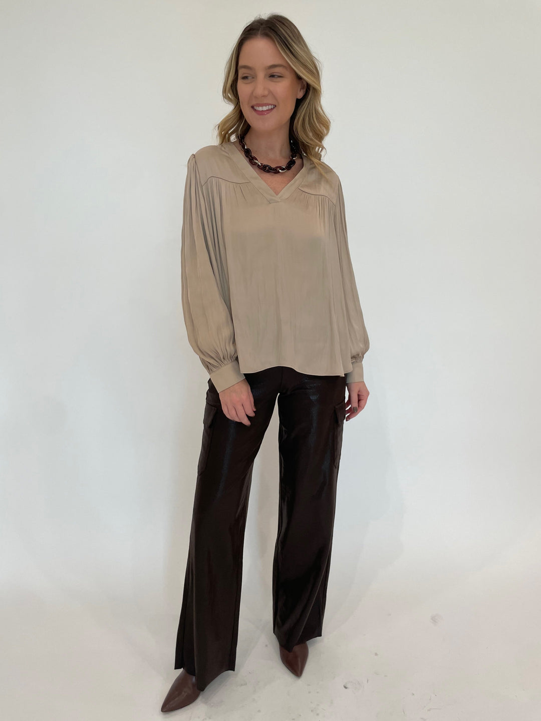 Lola & Sophie Lola & Sophie Vintage Satin Blouse in Gold paired with Lysse Callie Patent Foil Vegan Suede Cargo Pants in Liquid Mocha, Pono Riley Necklace in Hickory available at Barbara Katz