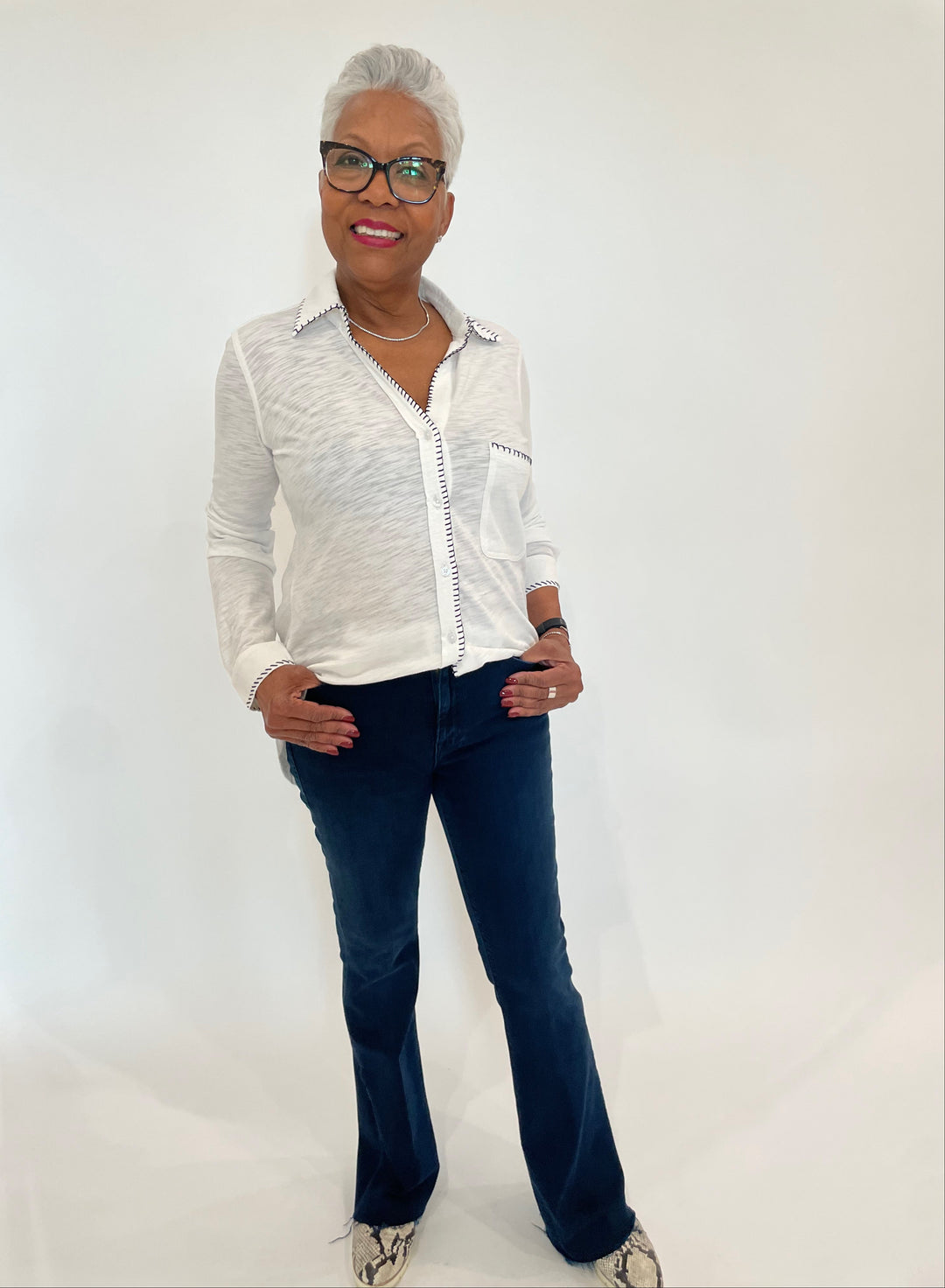 BK Joah Whipstitch Amrat Jersey Blouse in White paired with Mother The Weekender Fray Jeans in Chip On My Shoulder available at Barbara Katz