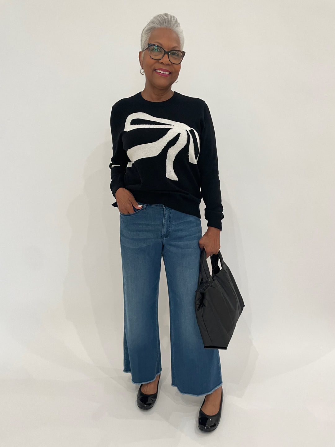 Zaket & Plover Angie Dress Me Up Sweater in Black paired with MAC Denim Dream Wide Crop Wonder Jeans, Gabor Cap Toe Ballet Flats in Black, Daniella Lehavi Quilt Medium Tote Bag in Black available at Barbara Katz