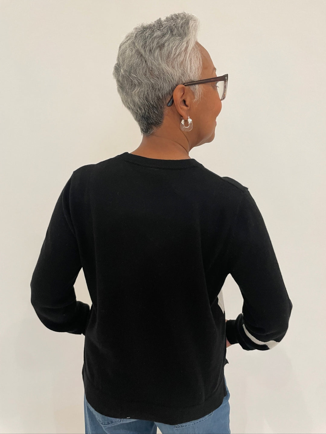 Zaket & Plover Angie Dress Me Up Pullover Sweater in Black with Lizzie Fortunato Clear Organic Hoop Earrings available at Barbara Katz