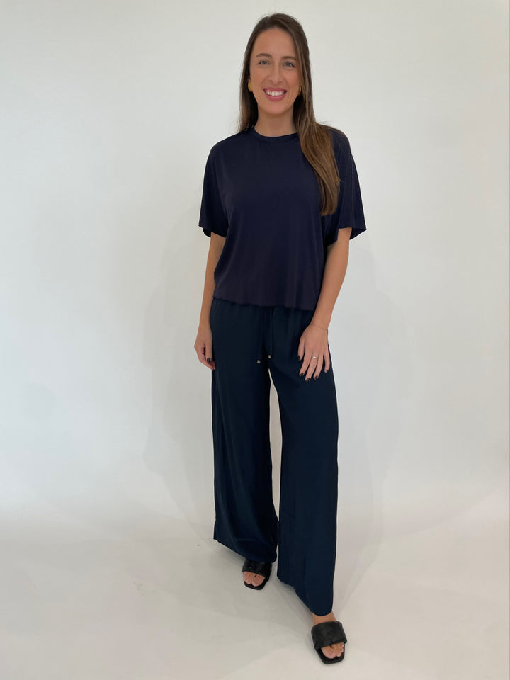 Lola & Sophie D Satin Crew Neck Top in Night Watch paired with matching Lola  & Sophie 31" Satin Pants in Night Watch available at Barbara Katz