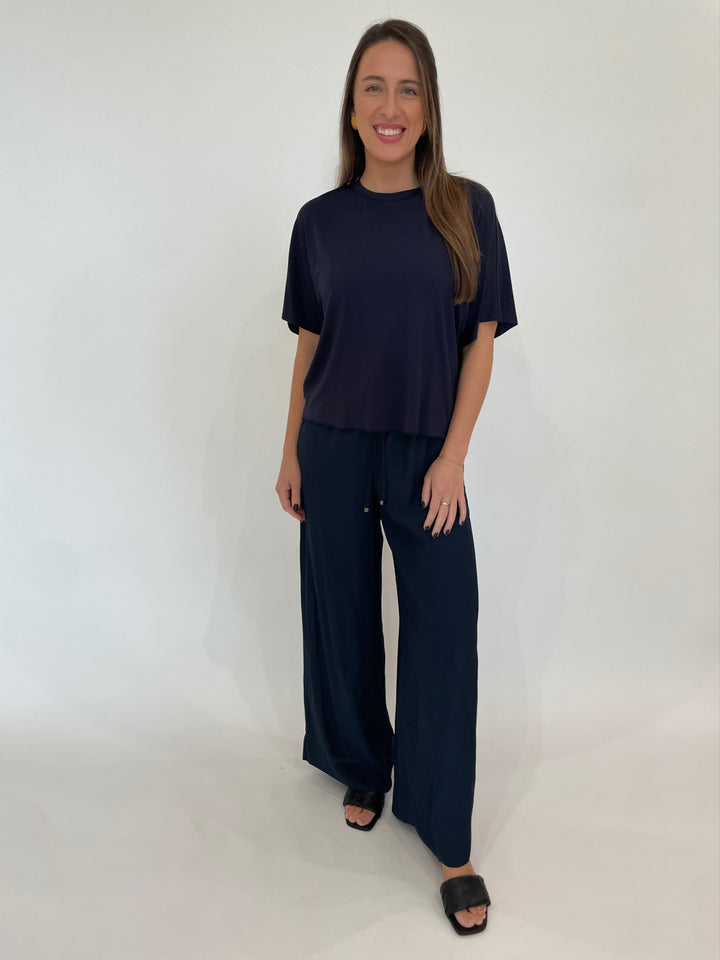 Lola & Sophie D Satin Crew Neck Top in Night Watch paired with matching Lola  & Sophie 31" Satin Pants in Night Watch available at Barbara Katz