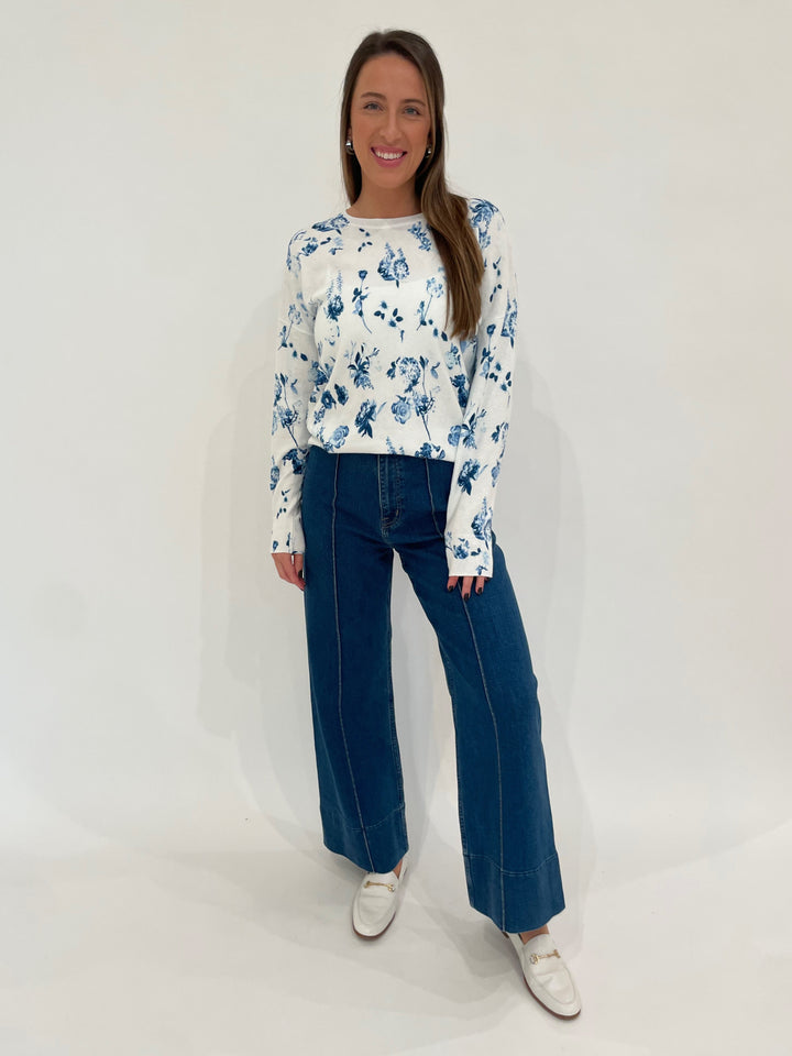 Pistola Denim Penny Pintuck High Rise Wide Leg Jeans in Country Club paired with J Society Marilyn Flower Sweater in Blue/White available at Barbara Katz