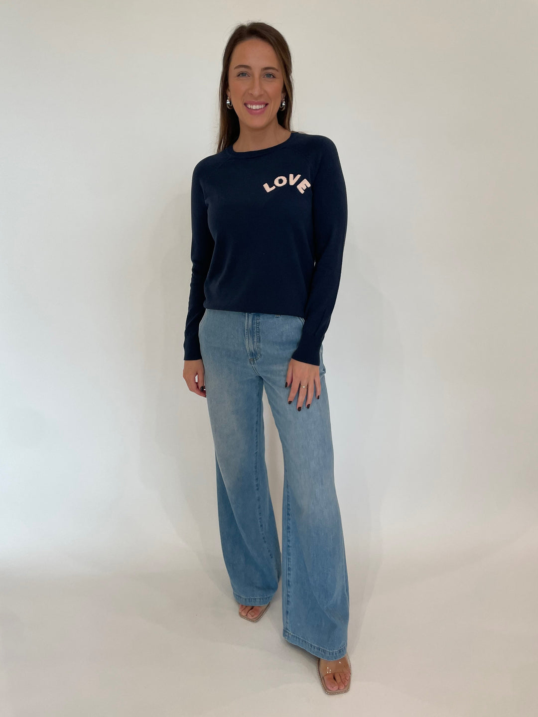 Pistola Denim Dalia High Rise Wide Leg Jeans in Palo Alto paired with J Society Marsha Love Sweater in Navy available at Barbara Katz