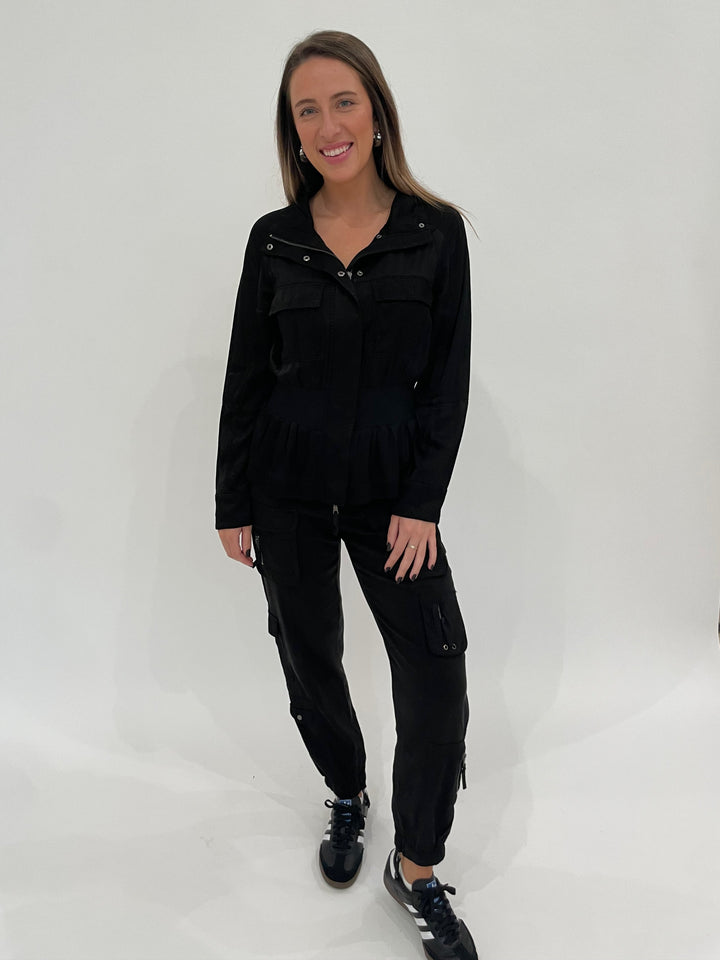 Marrakech Solara Viscose Satin Peplum Jacket in Black paired with matching Cabo Cupro Pants in Black available at Barbara Katz