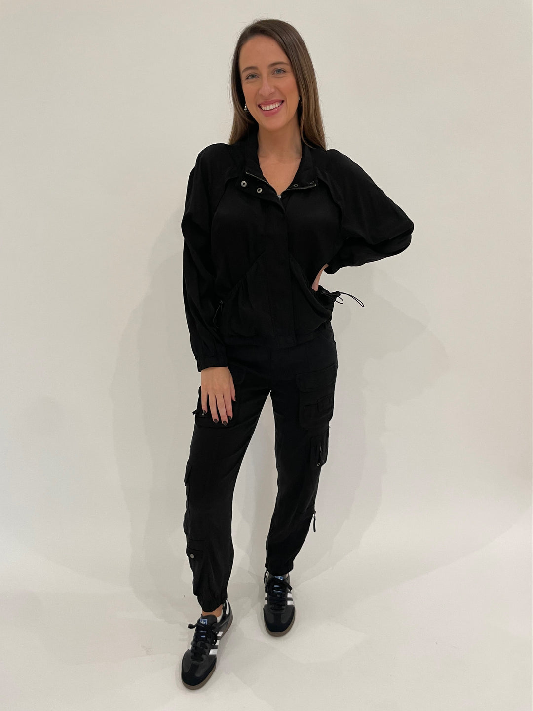 Marrakech Bali Stretch Cupro Windbreaker Jacket in Black paired with matching Cabo Cupro Pants in Black available at Barbara Katz