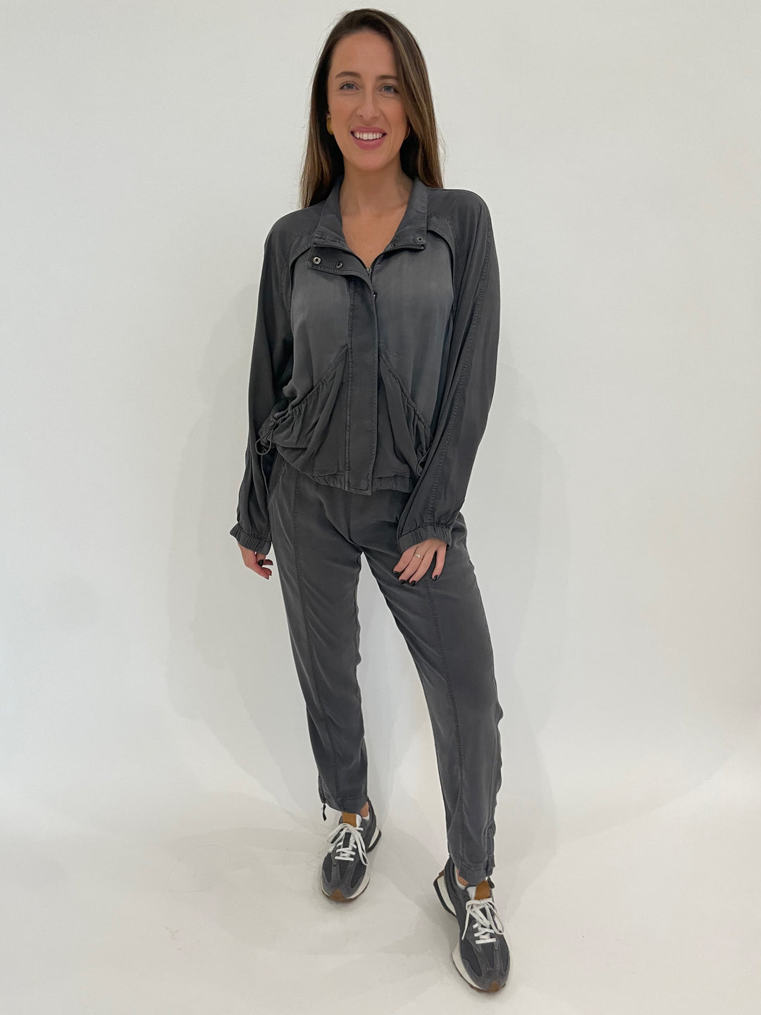 Marrakech Bali Stretch Cupro Windbreaker Jacket in Gunmetal paired with matching Melody Stretch Cupro Jogger in Gunmetal available at Barbara Katz