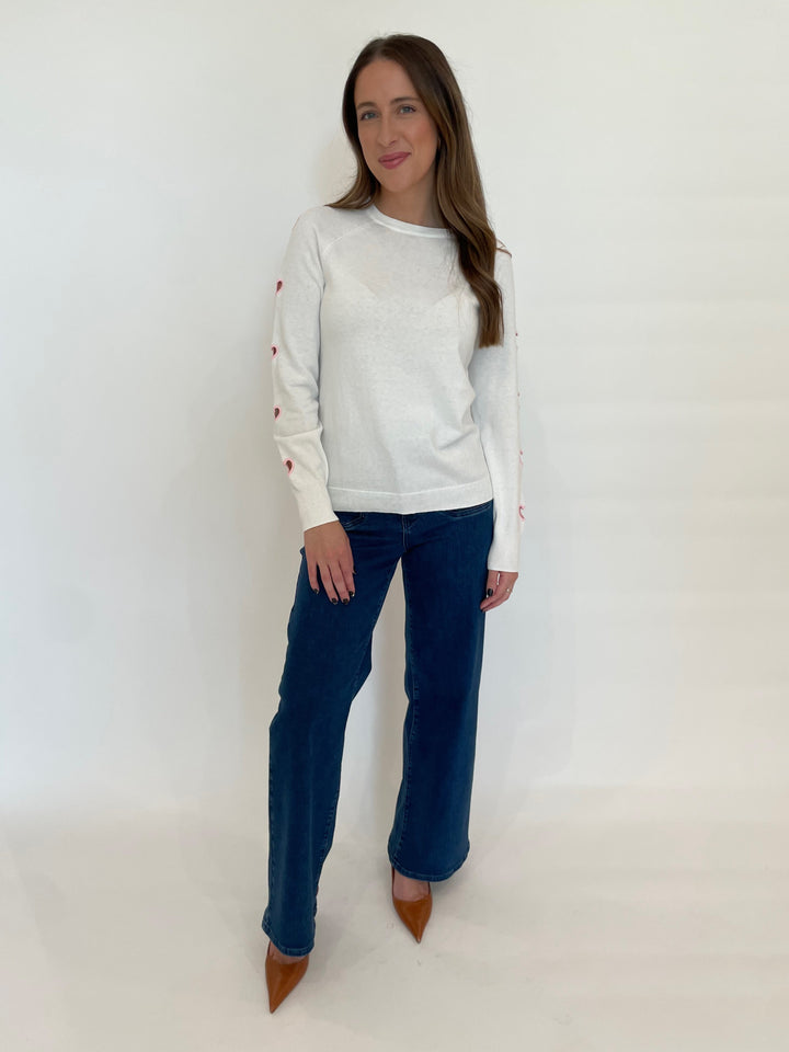 J Society Linny Heart Crew Sweater in White/Pink paired with Frame Le Slim Palazzo Modernist Pocket Jeans in Loner available at Barbara Katz