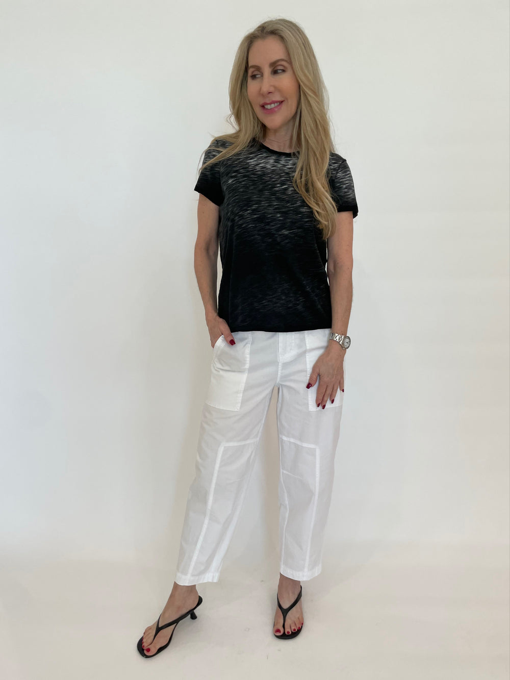 Marrakech Azure Pants in White paired with Goldie Gradient Sunrise Boy Tee in Black available at Barbara Katz