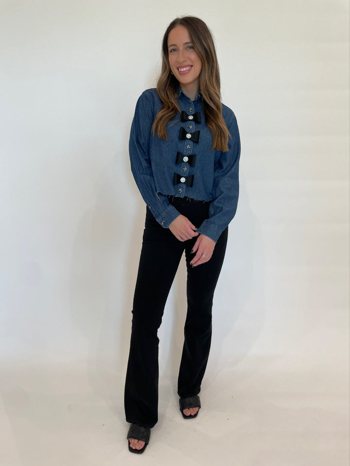 Suzy T Denim Crop Shirt With Bows in Denim paired with Frame Jetset Flare Pintuck Denim in Sheen Noir available at Barbara Katz