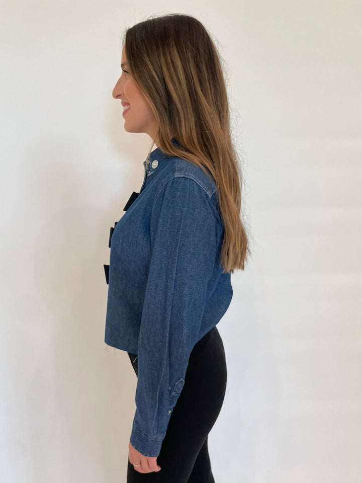 Suzy T Denim Long Sleeve Crop Shirt With Bows in Denim/Black available at Barbara Katz