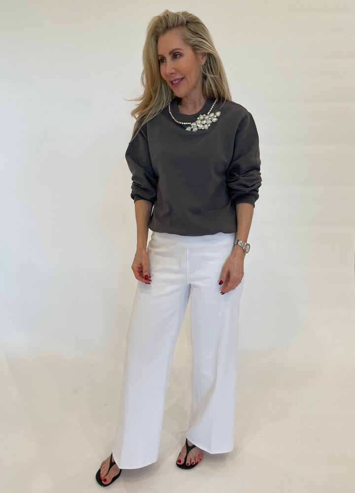 Suzy T Lisse Crew Sweater With CZ in Grey paired with Lysse Erin Hi-Waist Wide Leg Jeans in White available at Barbara Katz