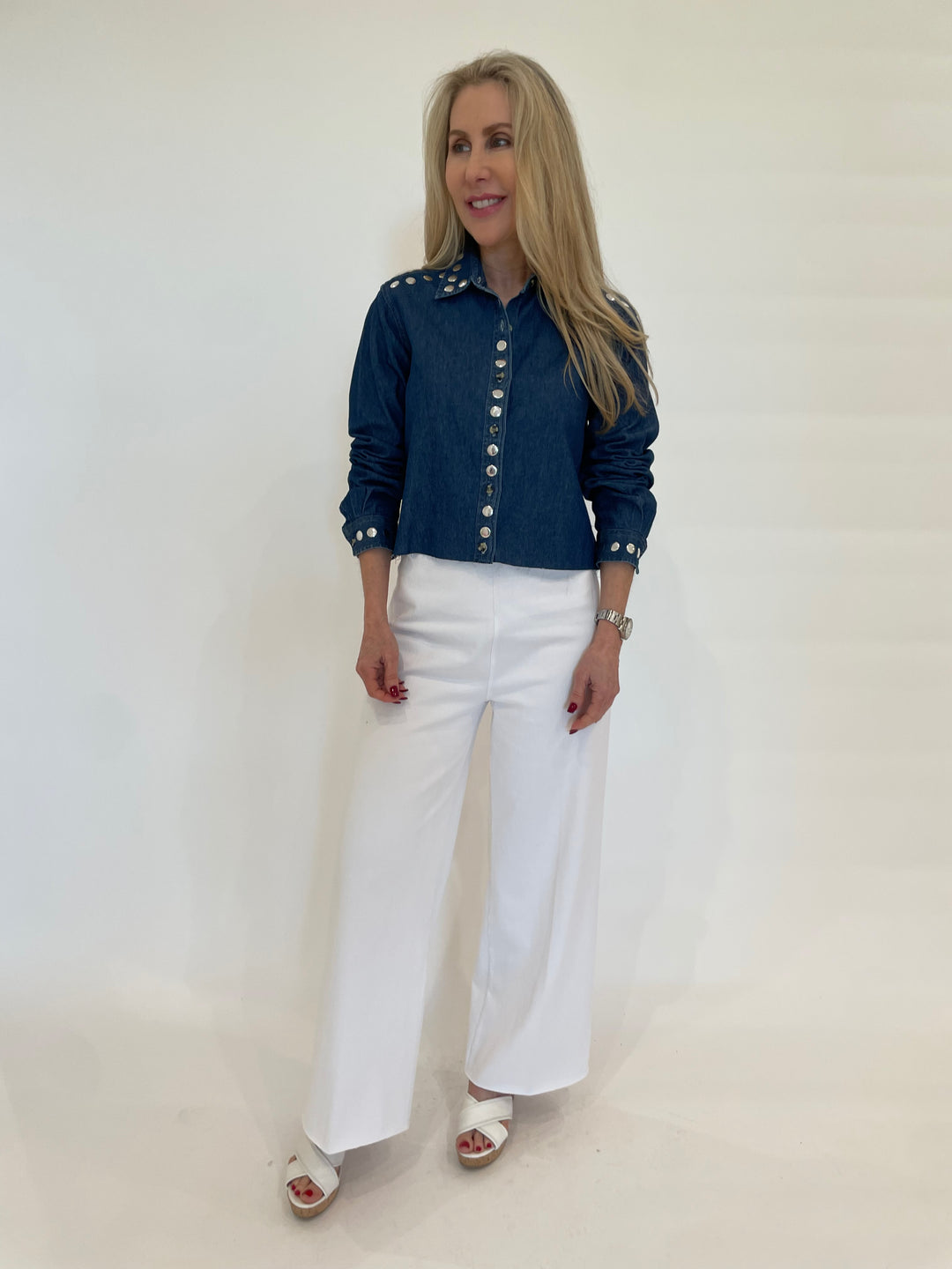 Suzy T Marcia Crop Shirt With Studs in Denim paired with Lysse Erin Hi-Waist Wide Leg Jeans in White available at Barbara Katz