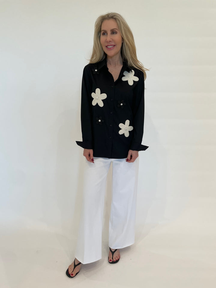 Suzy T Lau Beaded Flower Shirt in Black paired with Lysse Erin Hi-Waist Wide Leg Pants in White available at Barbara Katz