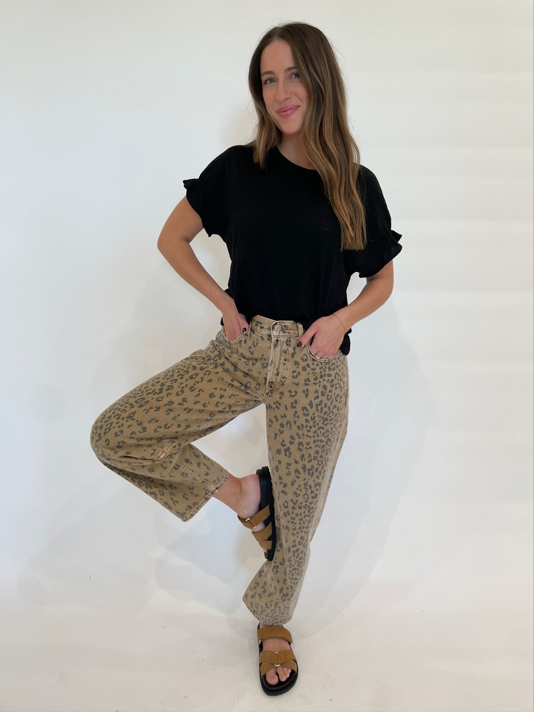 Goldie Signature Slub Puff & Ruffle Sleeve Tee in Black paired with Citizens of Humanity Miro Relaxed Jeans in Natural Cheetah available at Barbara Katz