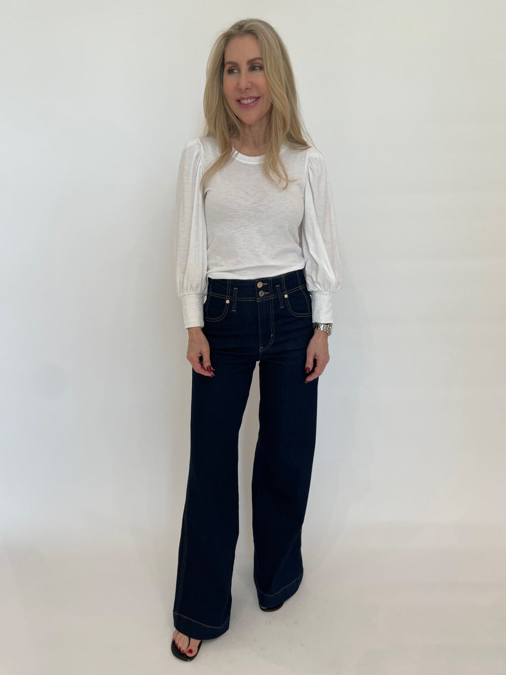 Nation Ltd Loren Smocked Peasant Tee in White paired with Frame The Seamed Wide Trouser in Rinse available at Barbara Katz