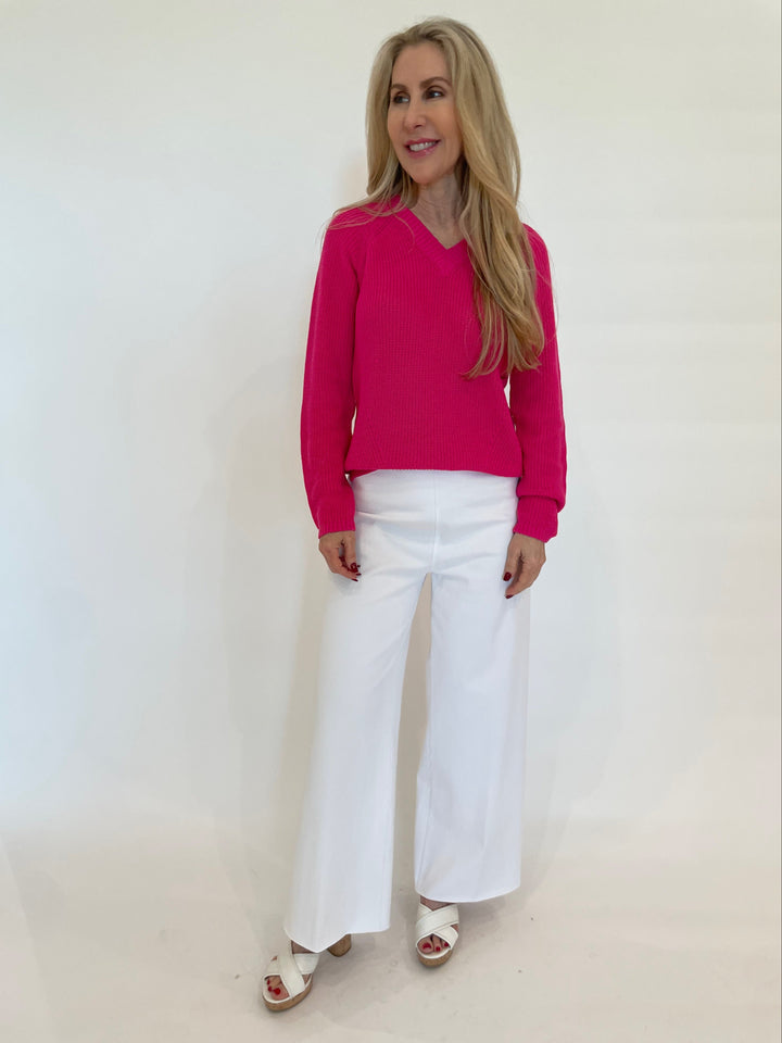 Pure Amici Myrna V-Neck Shaker Knit Sweater in Magenta paired with Lysse Erin Hi-Waist Wide Leg Denim in White available at Barbara Katz