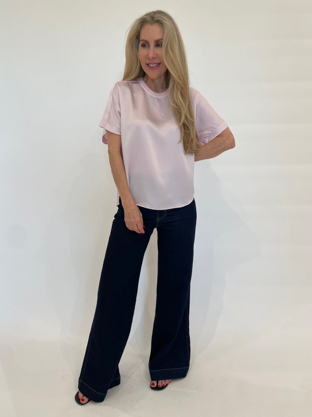 Simkhai Addy Short Sleeve Knit Back T- Shirt in Ballet Pink paired with Frame The Seamed Wide Trouser in Rinse available at Barbara Katz