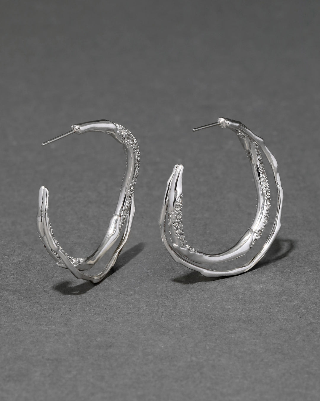 Alexis Bittar Solanales Crystal Twist Hoop Earrings in Silver available at Barbara Katz