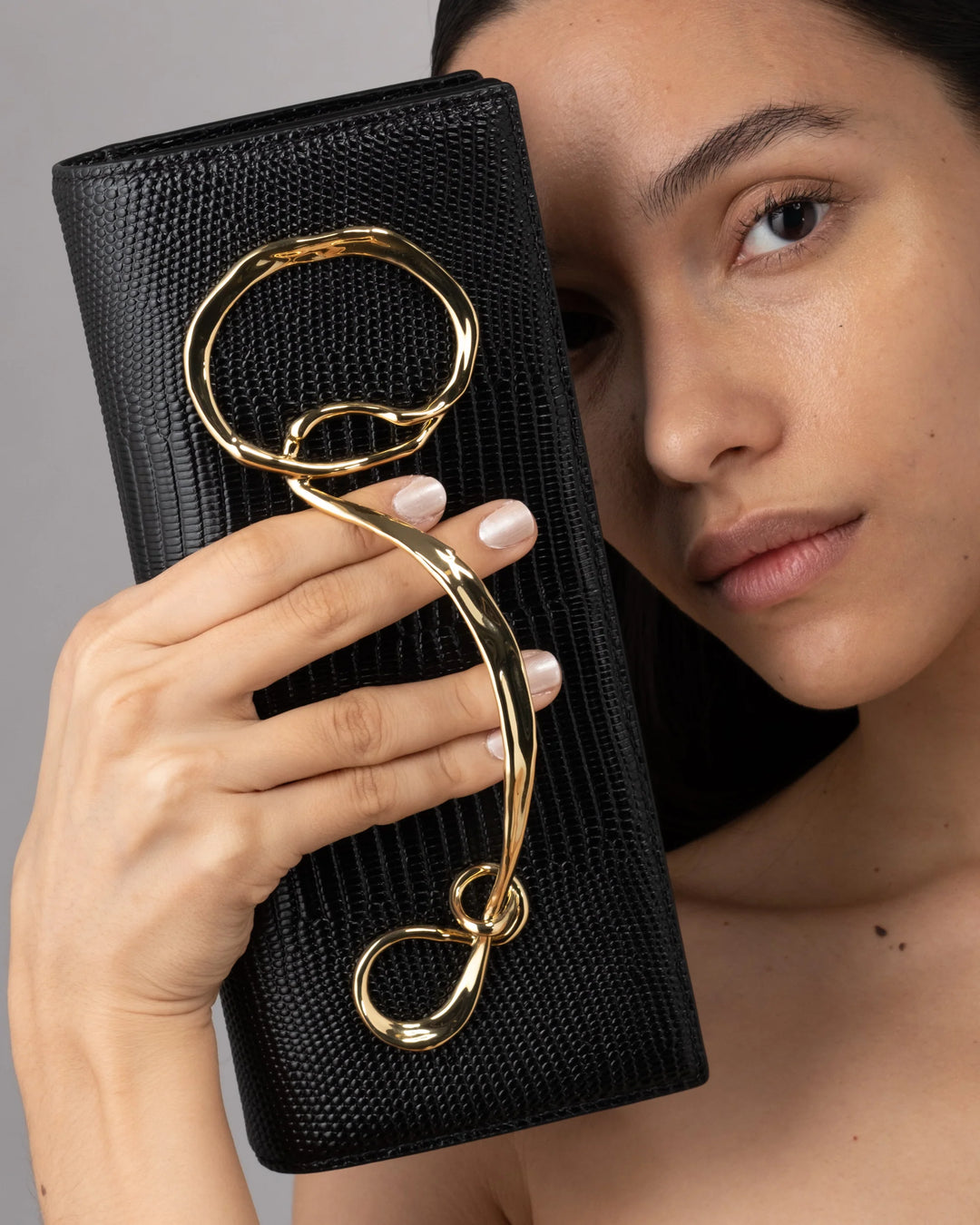 Alexis Bittar Twisted Gold Side Handle Clutch Bag in Black available at Barbara Katz