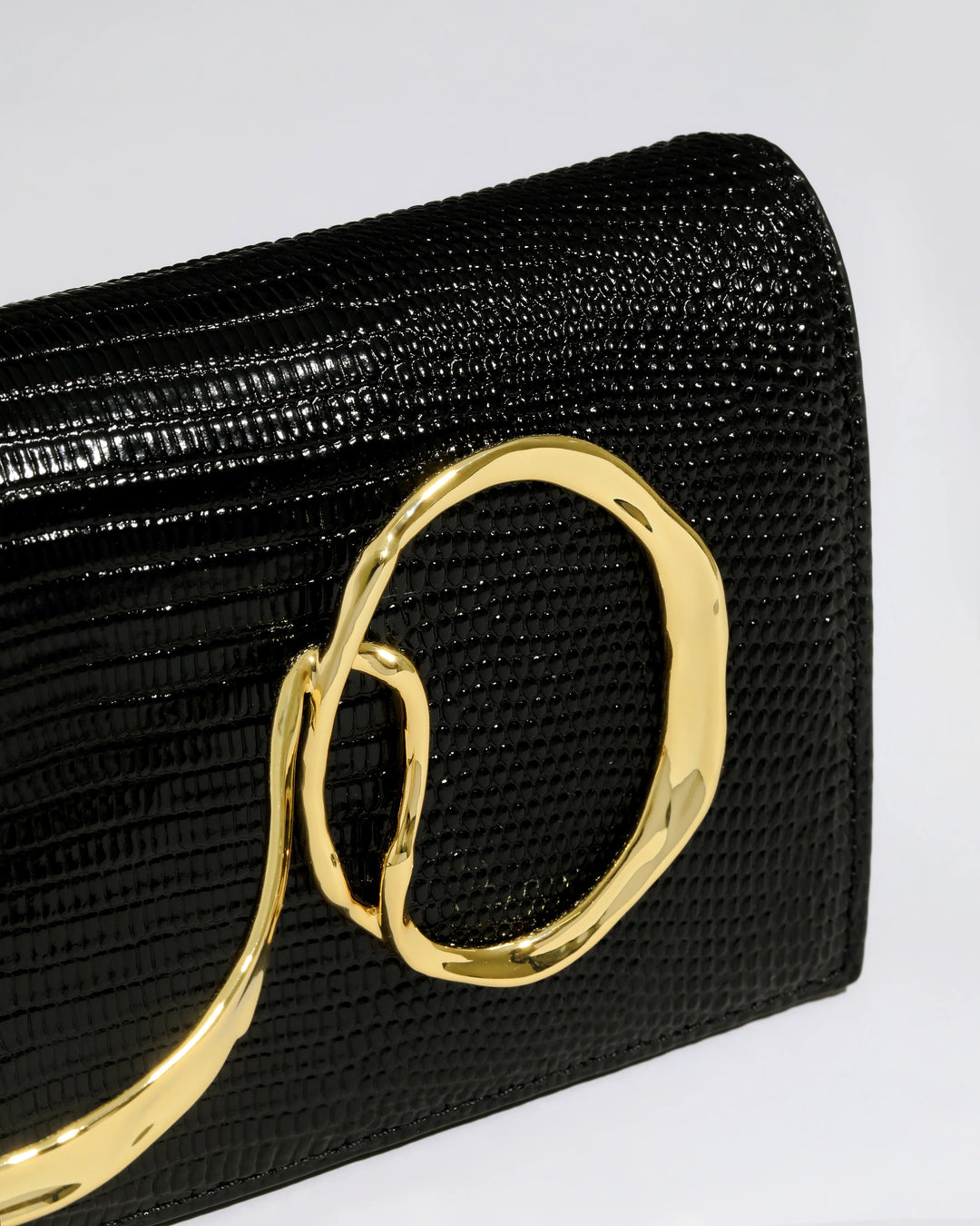 Alexis Bittar Twisted Gold Side Handle Clutch Bag in Black available at Barbara Katz