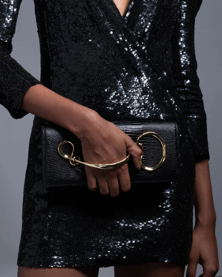 Alexis Bittar Twisted Gold Side Handle Clutch Bag in Black Leather available at Barbara Katz